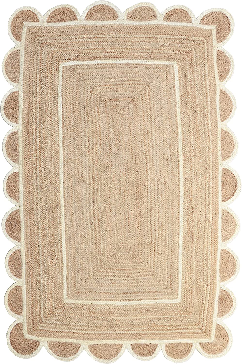 Handwoven natural jute scalloped rectangular area rug with ivory border styled in a modern Scandinavian living room.