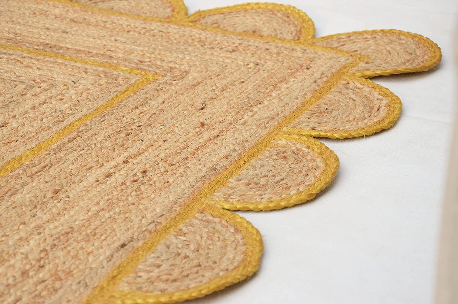 handwoven-natural-jute-rug-mustard-yellow-scalloped-border.jpg