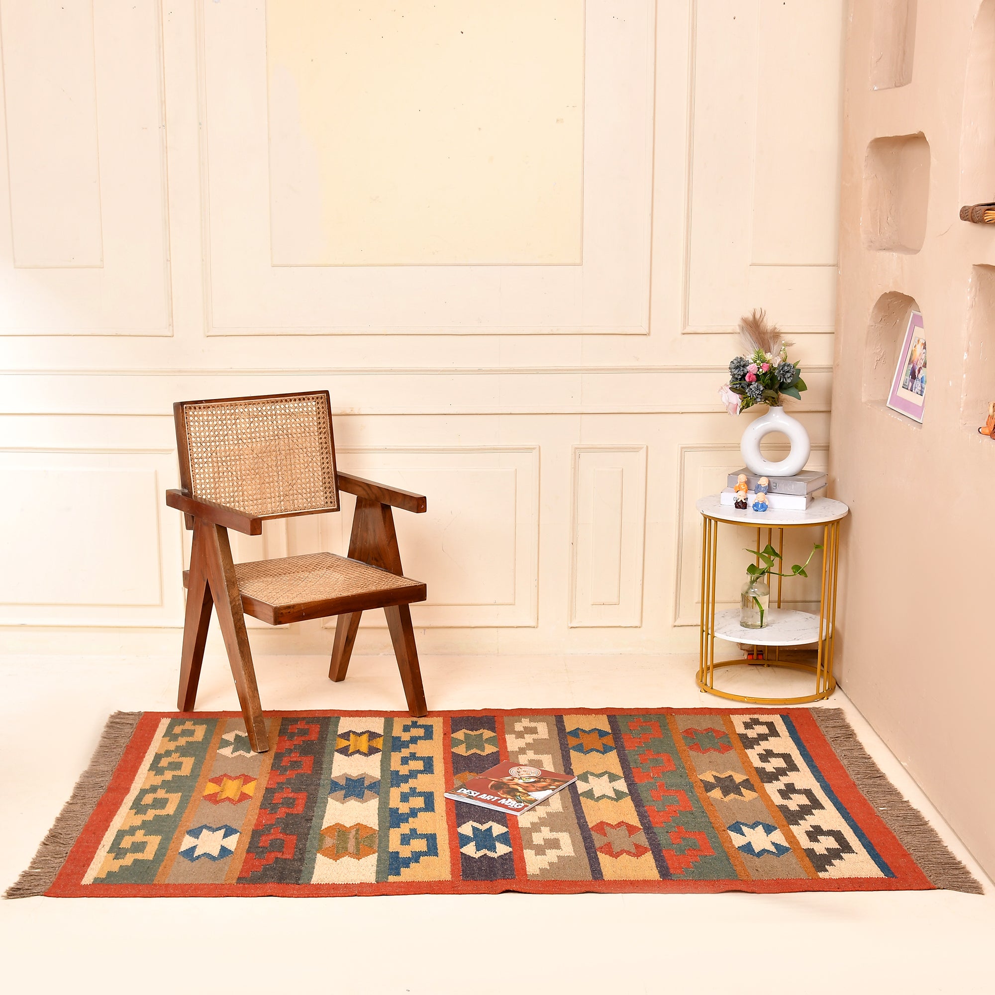 Handwoven Southwestern Kilim wool cotton area rug with colorful tribal geometric pattern in a modern living room.