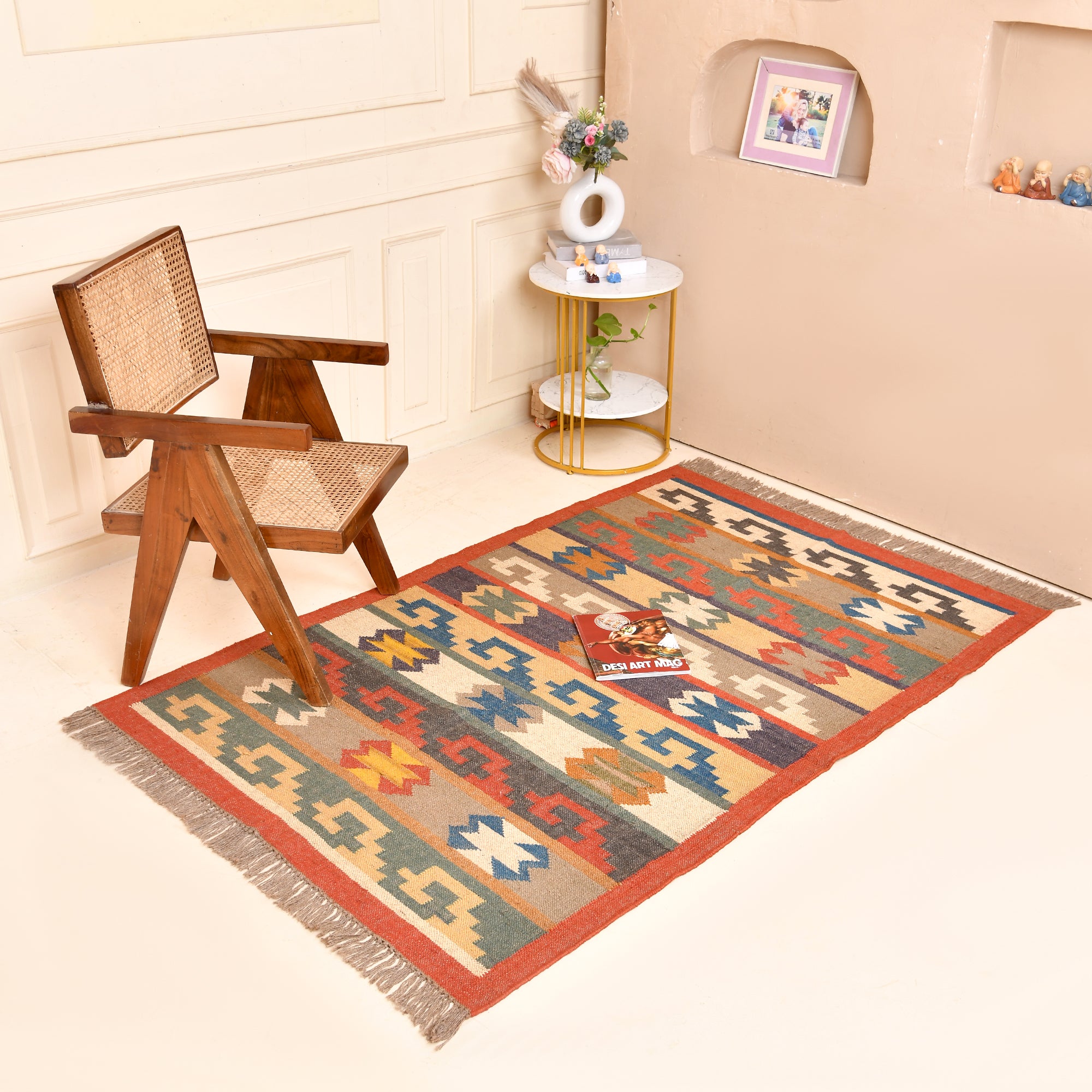Handwoven Southwestern Kilim wool cotton area rug with colorful tribal geometric pattern in a modern living room.
