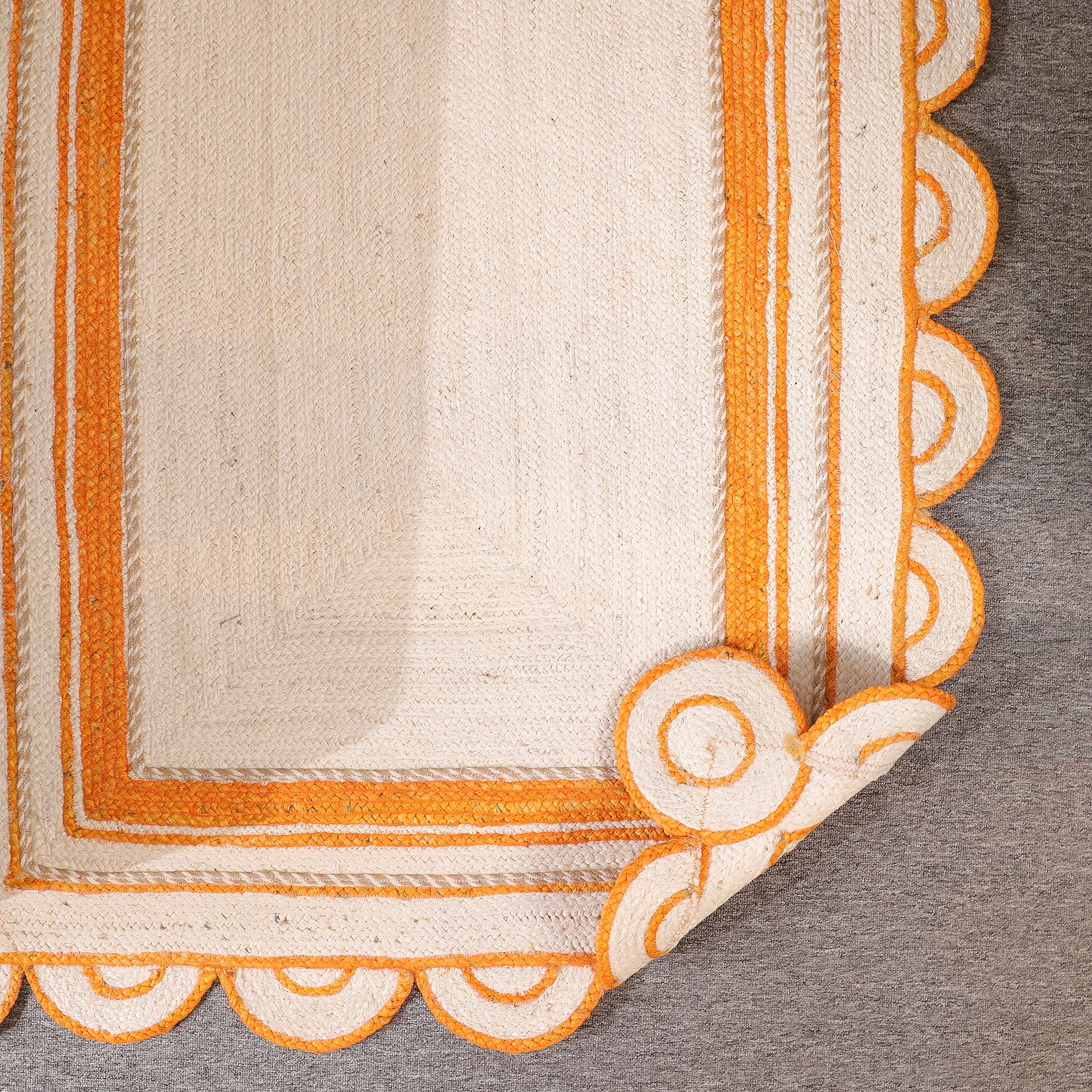 Handwoven Natural Jute Rug with Orange Sacalloped Border Eco-Friendly Braided Area Rug