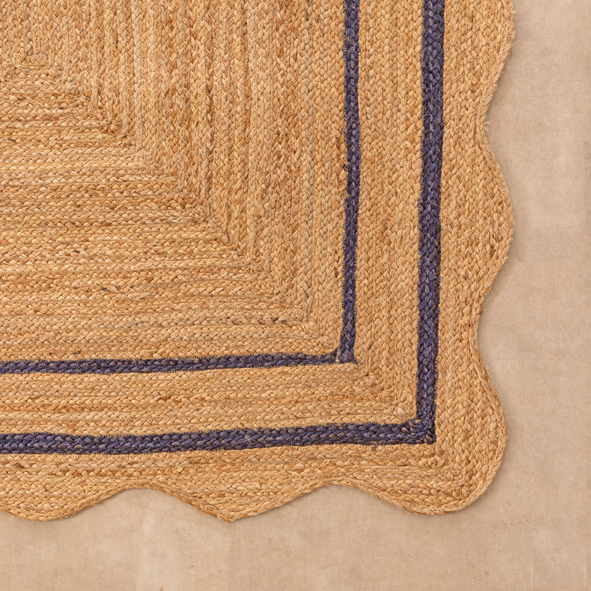 Handwoven Natural Jute Area Rug with Navy Blue Double Striped Border