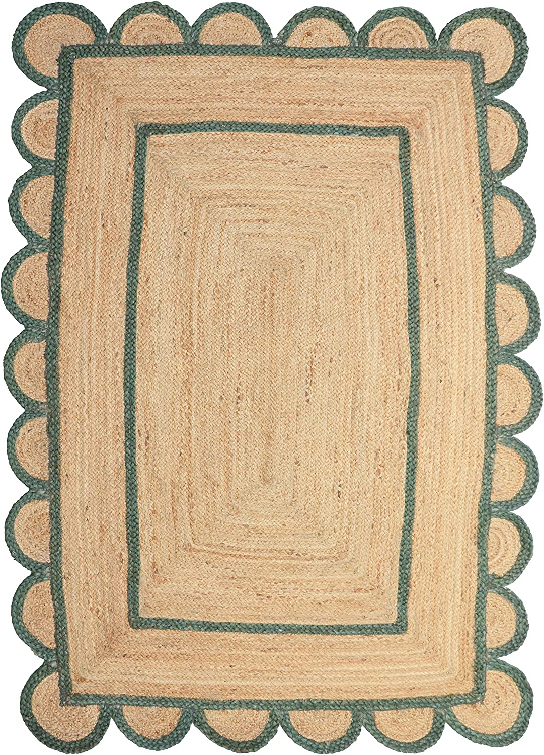 Handwoven natural jute area rug with green scalloped border placed in a modern Scandinavian living room featuring sustainable eco-friendly braided craftsmanship.