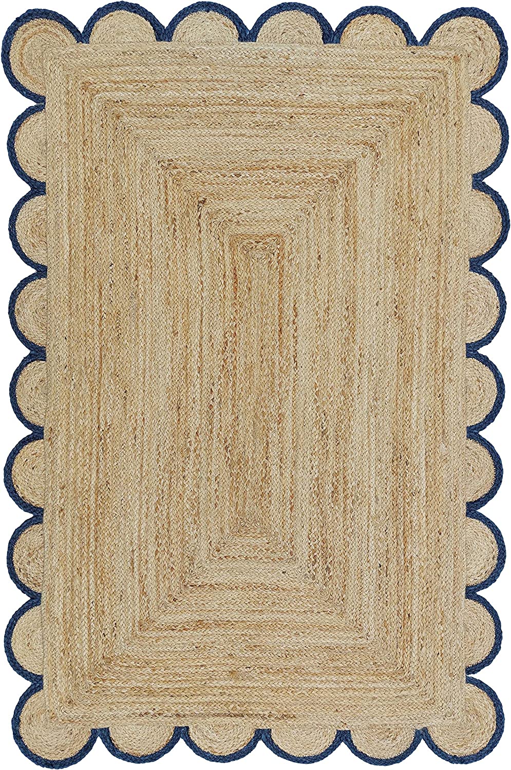 Handmade natural jute scalloped border area rug with blue trim in a bright farmhouse style living room.