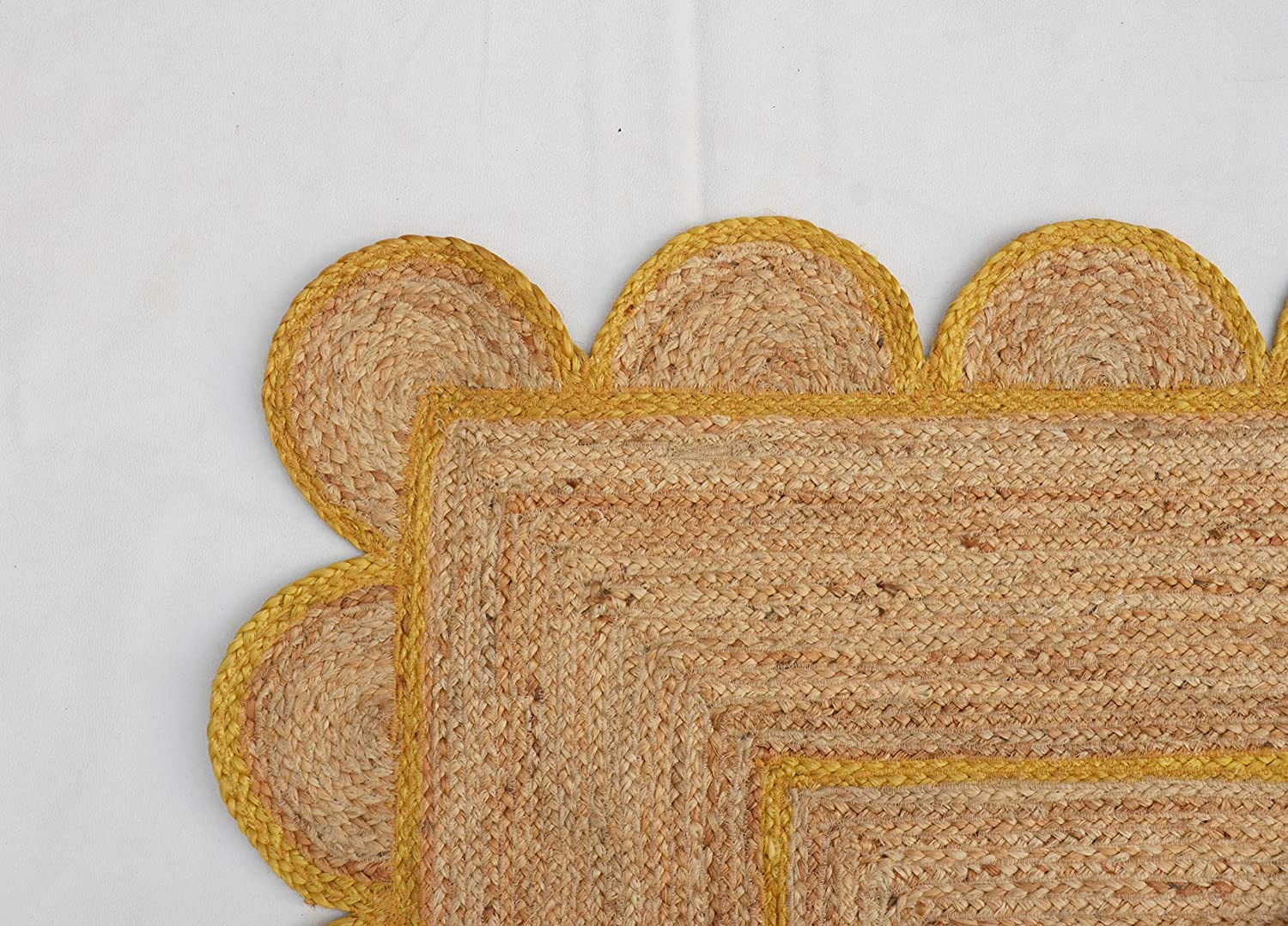 handwoven-natural-jute-rug-mustard-yellow-scalloped-border.jpg