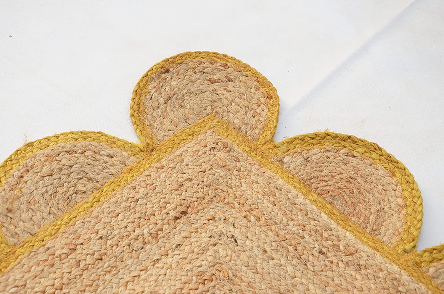 handwoven-natural-jute-rug-mustard-yellow-scalloped-border.jpg