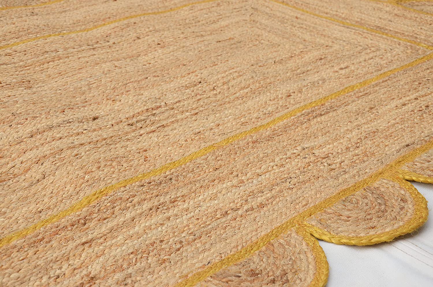 handwoven-natural-jute-rug-mustard-yellow-scalloped-border.jpg