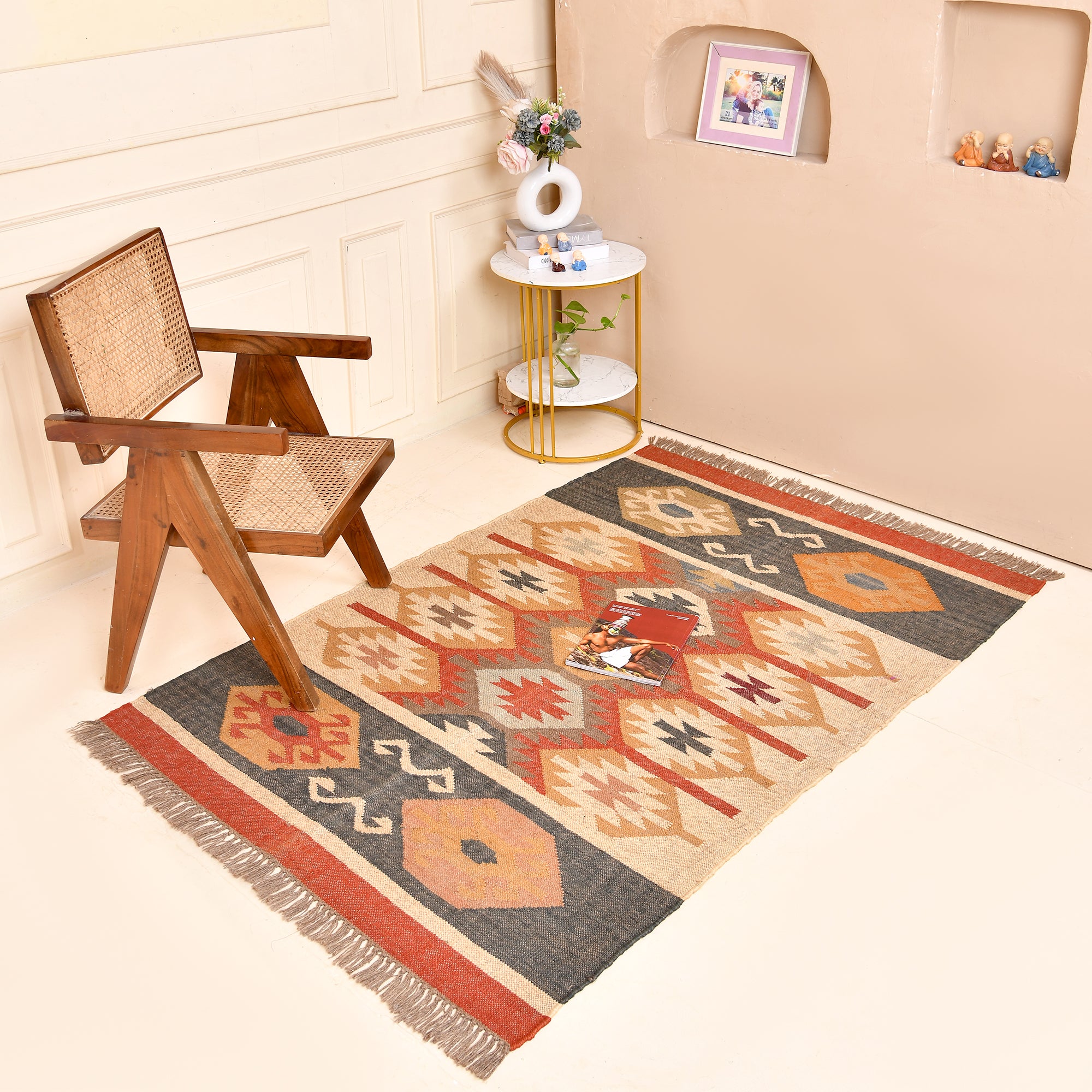 Handmade wool and jute flatweave tribal geometric area rug with beige, charcoal, terracotta, and mustard pattern for living room, bedroom, hallway, and entryway.