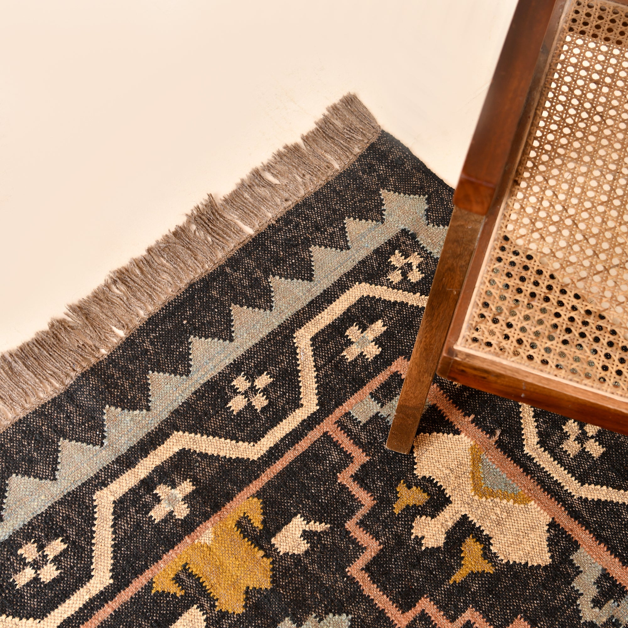 Handwoven black tribal geometric wool Kilim area rug with fringe for living room and bedroom decor