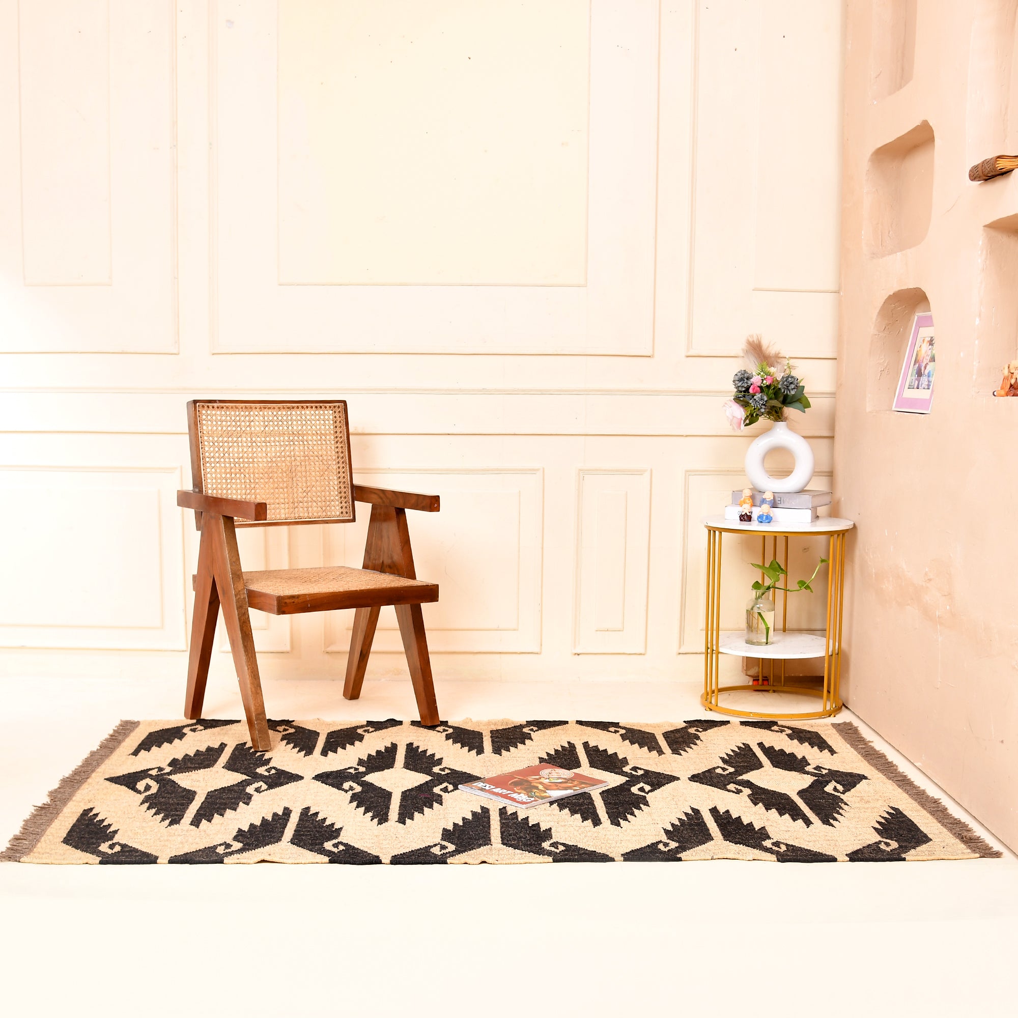 Handwoven black and ivory wool jute tribal flatweave area rug for living room and bedroom.