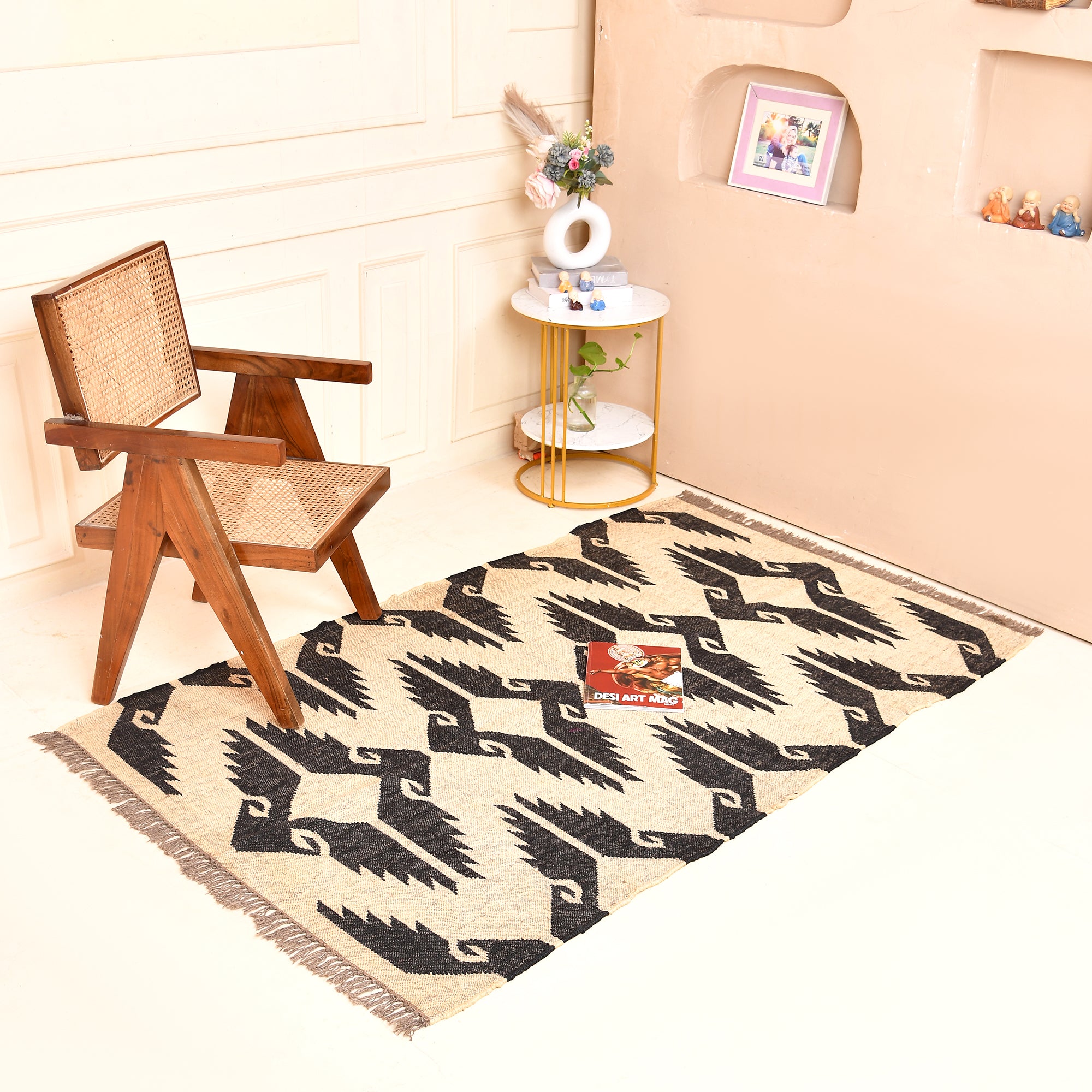 Handwoven black and ivory wool jute tribal flatweave area rug for living room and bedroom.