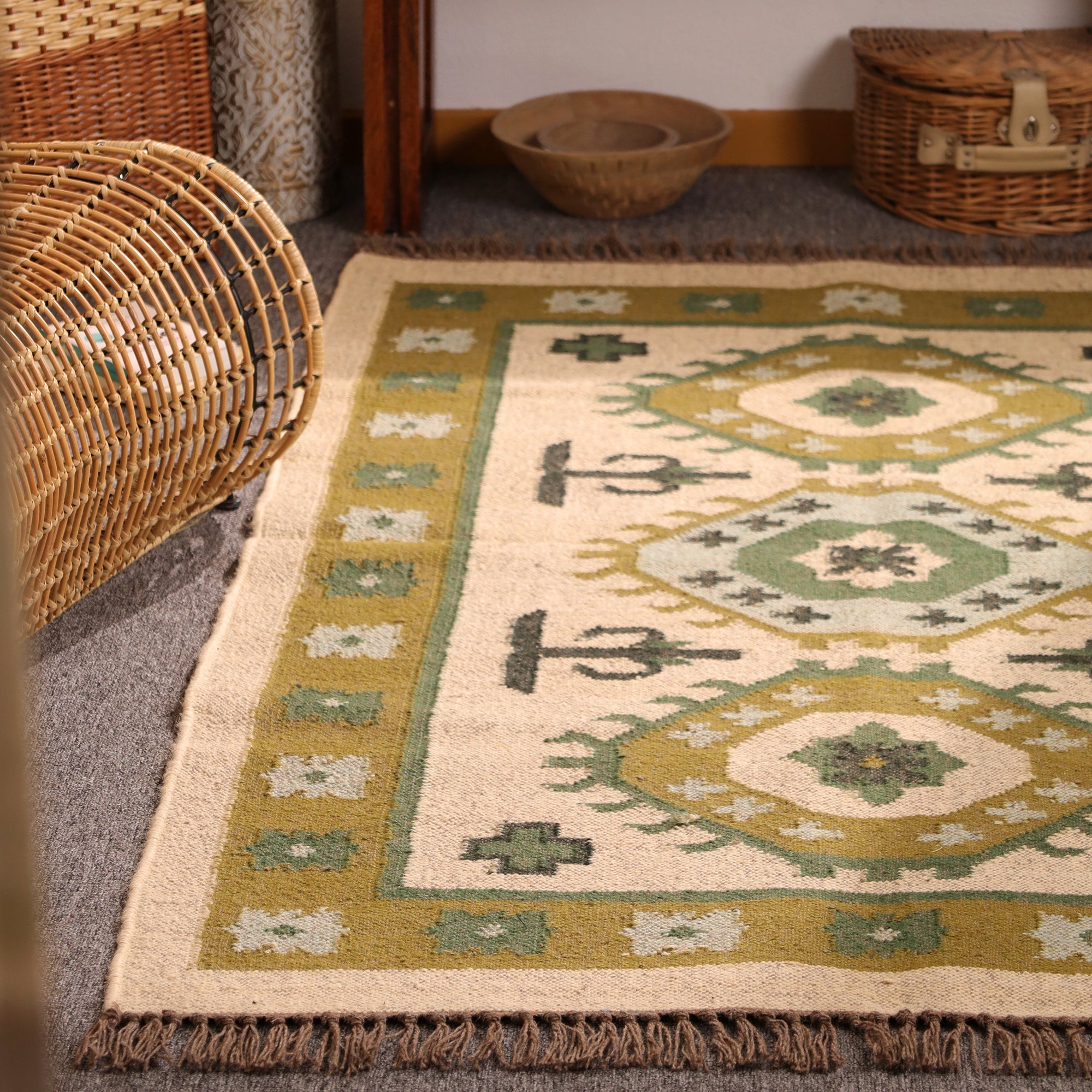 Handmade green Kilim wool rug with tribal geometric design for living room